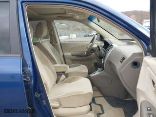 2006 Hyundai Tucson GLS with VIN KM8JN72D06U325677, listed as a IAAI auction lot 42065674 with 168,044 mi miles. Bid and sale history available at carsss.com. Image 5.