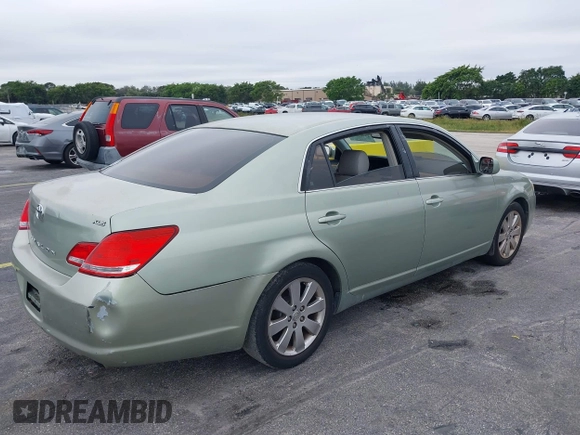 2005 Toyota Avalon XL with VIN 4T1BK36B65U005616, listed as a IAAI auction lot 41404396 with 99,397 mi miles and . Bid and sale history available at DreamBid. Image 4.