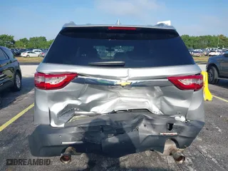 2018 Chevrolet Traverse LT Cloth with VIN 1GNERGKW8JJ147739, listed as a IAAI auction lot 42005332 with 104,373 mi miles. Bid and sale history available at carsss.com. Image 6.