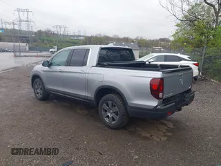 2020 Honda Ridgeline RTL-E with VIN 5FPYK3F73LB004365, listed as a IAAI auction lot 41965887 with 80,981 mi miles and . Bid and sale history available at DreamBid. Image 3.