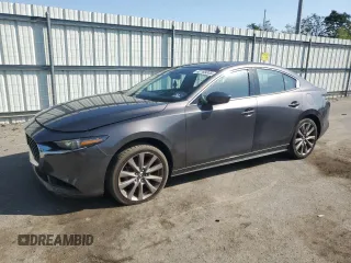 2019 Mazda 3 Premium z VIN 3MZBPAEM9KM103999, wystawiony jako Copart lot #62169335 z przebiegiem 74 512 mil mil oraz Szkoda całkowita • Salvage title. Historia ofert i sprzedaży dostępna na DreamBid. Obrazek 1.