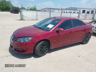 2009 Pontiac G6 1SB with VIN 1G2ZJ57B694245677, listed as a IAAI auction lot 42645718 with 188,261 mi miles and . Bid and sale history available at DreamBid. Image 2.