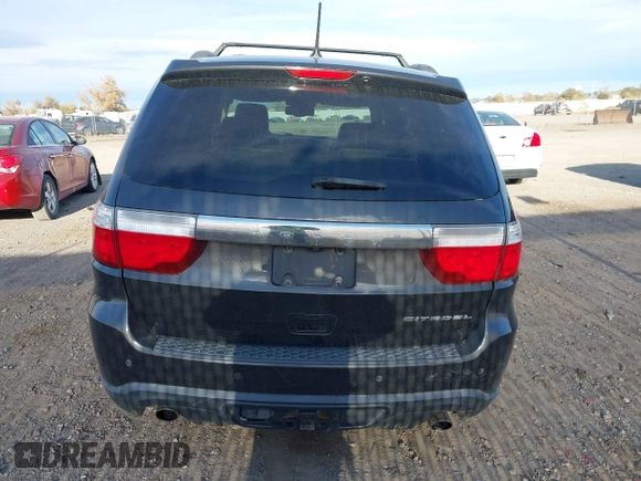 2011 Dodge Durango Citadel with VIN 1D4SE5GT3BC613998, listed as a IAAI auction lot 40760507 with 172,968 mi miles. Bid and sale history available at carsss.com. Image 16.