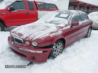 2003 Jaguar X-Type 2.5L Manual z VIN SAJEA51D63XC89273, wystawiony jako IAAI lot #41298544 z przebiegiem 124 400 mil mil oraz . Historia ofert i sprzedaży dostępna na DreamBid. Obrazek 19.