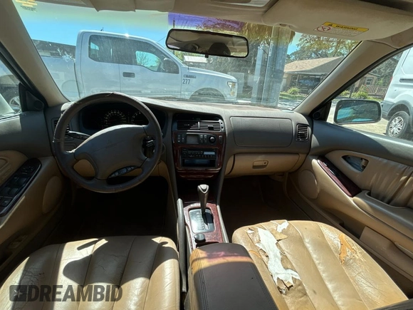 2000 Mitsubishi Diamante LS z VIN 6MMAP67P4YT001142, wystawiony jako Copart lot #49667135 z przebiegiem 243 861 mil mil oraz Tytuł czysty. Historia ofert i sprzedaży dostępna na DreamBid. Obrazek 9.