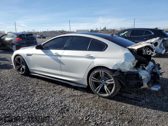 2017 BMW M6 with VIN WBS6E9C56HG437410, listed as a Copart auction lot 80217694 with 68,335 mi miles and Salvage title. Bid and sale history available at DreamBid. Image 2.
