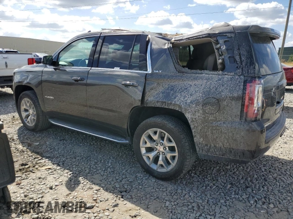 2020 GMC Yukon SLT with VIN 1GKS1BKC3LR238700, listed as a Copart auction lot 74897254 with 82,806 mi miles and Salvage Title. Bid and sale history available at DreamBid. Image 2.