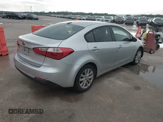 2014 Kia Forte LX with VIN KNAFX4A63E5099825, listed as a IAAI auction lot 42119316 with 174,551 mi miles and . Bid and sale history available at carsss.com. Image 4.