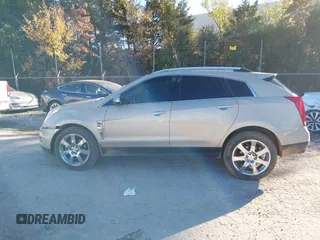 2011 Cadillac SRX Performance Collection with VIN 3GYFNBEY3BS529406, listed as a IAAI auction lot 40926089 with 160,535 mi miles. Bid and sale history available at carsss.com. Image 14.