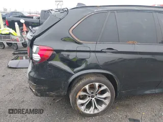 2015 BMW X5 xDrive50i z VIN 5UXKR6C56F0J78575, wystawiony jako IAAI lot #41933018 z przebiegiem Nie podano mil oraz . Historia ofert i sprzedaży dostępna na DreamBid. Obrazek 21.