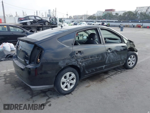 2007 Toyota Prius with VIN JTDKB20U977660315, listed as a IAAI auction lot 42097560 with 158,187 mi miles. Bid and sale history available at carsss.com. Image 4.