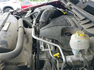 2014 Ram 1500 Express z VIN 3C6JR6ATXEG310186, wystawiony jako IAAI lot #42221601 z przebiegiem 56 684 mil mil oraz . Historia ofert i sprzedaży dostępna na DreamBid. Obrazek 19.