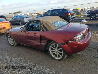 2007 Mazda MX-5 Miata Sport z VIN JM1NC25F970124896, wystawiony jako Copart lot #83624394 z przebiegiem 62 735 mil mil oraz Szkoda całkowita • Salvage title. Historia ofert i sprzedaży dostępna na DreamBid. Obrazek 2.