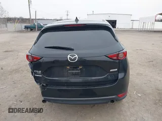 2017 Mazda CX-5 Grand Touring with VIN JM3KFBDL6H0179557, listed as a IAAI auction lot 41546493 with 103,585 mi miles. Bid and sale history available at carsss.com. Image 16.