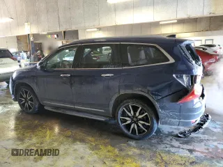 2020 Honda Pilot Touring 7-Passenger z VIN 5FNYF6H67LB031880, wystawiony jako Copart lot #46083925 z przebiegiem 59 729 mil mil oraz Szkoda całkowita • Salvage title. Historia ofert i sprzedaży dostępna na DreamBid. Obrazek 2.