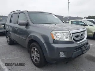 2011 Honda Pilot Touring z VIN 5FNYF4H99BB086568, wystawiony jako IAAI lot #42361080 z przebiegiem 110 549 mil mil oraz . Historia ofert i sprzedaży dostępna na DreamBid. Obrazek 1.