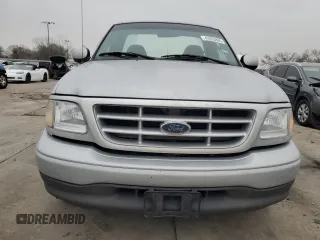 2002 Ford F-150 XL with VIN 1FTRF172X2NB77521, listed as a Copart auction lot 43993885 with 339,289 mi miles and Salvage Title. Bid and sale history available at carsss.com. Image 5.