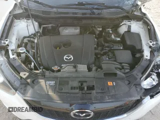 2014 Mazda CX-5 Grand Touring with VIN JM3KE4DYXE0377810, listed as a Copart auction lot 53071255 with 117,642 mi miles and Salvage Title. Bid and sale history available at DreamBid. Image 12.