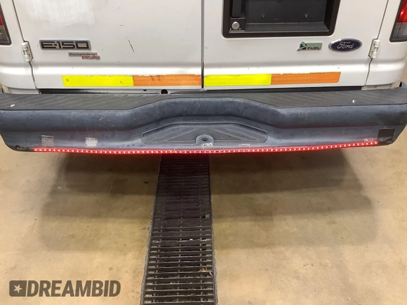 2013 Ford Econoline Cargo Commercial with VIN 1FTNE1EW9DDA61968, listed as a IAAI auction lot 42643038 with 121,719 mi miles and . Bid and sale history available at DreamBid. Image 16.