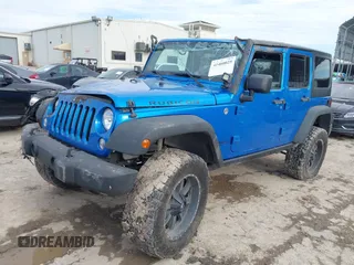 2015 Jeep Wrangler Unlimited Rubicon with VIN 1C4BJWFG5FL558348, listed as a IAAI auction lot 41460025 with 106,012 mi miles. Bid and sale history available at carsss.com. Image 17.