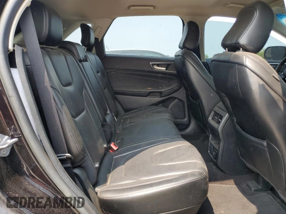 2020 Ford Edge Titanium z VIN 2FMPK4K97LBA56544, wystawiony jako Copart lot #59314005 z przebiegiem 84 861 mil mil oraz Czysty tytuł • Clean title. Historia ofert i sprzedaży dostępna na DreamBid. Obrazek 11.