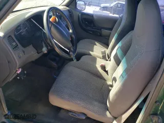 1999 Ford Ranger XLT with VIN 1FTYR11X7XTA88063, listed as a Copart auction lot 75098214 with 210,807 mi miles and Salvage Title. Bid and sale history available at carsss.com. Image 7.
