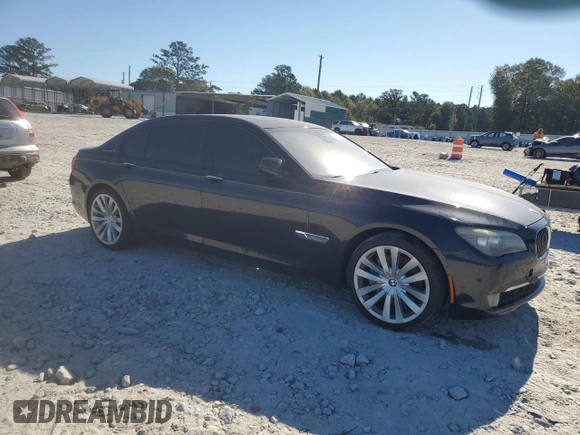 2011 BMW 7 Series with VIN WBAKX8C55BC198177, listed as a Copart auction lot 77016924 with 99,275 mi miles and Salvage title. Bid and sale history available at DreamBid. Image 4.
