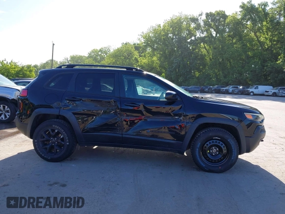 2019 Jeep Cherokee Latitude z VIN 1C4PJMCX2KD473275, wystawiony jako IAAI lot #42276497 z przebiegiem 123 117 mil mil oraz . Historia ofert i sprzedaży dostępna na DreamBid. Obrazek 14.