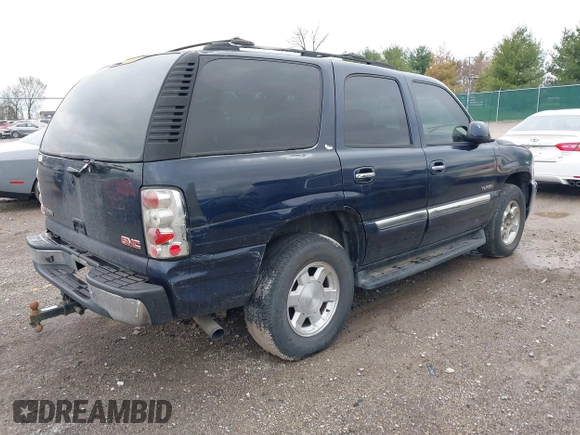 2005 GMC Yukon SLT with VIN 1GKEC13T45J139885, listed as a IAAI auction lot 41796394 with 229,494 mi miles. Bid and sale history available at carsss.com. Image 4.