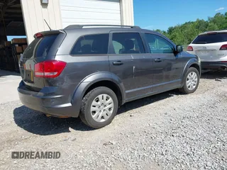 2015 Dodge Journey American Value z VIN 3C4PDCAB2FT565933, wystawiony jako IAAI lot #42327885 z przebiegiem 177 544 mil mil oraz . Historia ofert i sprzedaży dostępna na DreamBid. Obrazek 4.