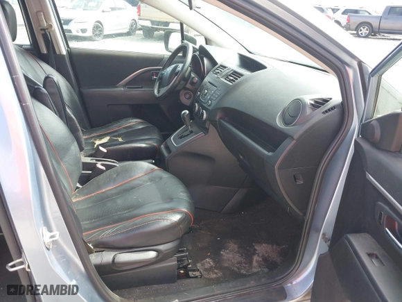 2012 Mazda Mazda5 Grand Touring with VIN JM1CW2DL1C0142664, listed as a IAAI auction lot 41585909 with 211,875 mi miles. Bid and sale history available at carsss.com. Image 5.