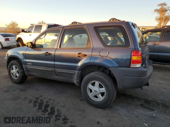 2001 Ford Escape XLS with VIN 1FMYU02141KE82552, listed as a Copart auction lot 78505184 with 223,429 mi miles and Salvage Title. Bid and sale history available at carsss.com. Image 2.