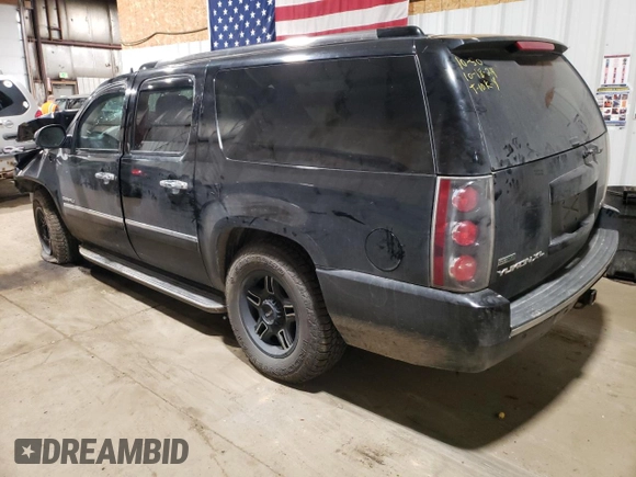 2012 GMC Yukon XL Denali with VIN 1GKS2MEFXCR319109, listed as a Copart auction lot 77485124 with Not Provided miles and Salvage Title. Bid and sale history available at carsss.com. Image 2.