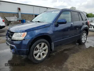 2012 Suzuki Grand Vitara Limited with VIN JS3TD0D74C4100125, listed as a Copart auction lot 58935355 with 218,085 mi miles and Salvage title. Bid and sale history available at DreamBid. Image 1.