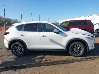 2017 Mazda CX-5 Touring with VIN JM3KFBCL4H0125501, listed as a IAAI auction lot 41979179 with 109,926 mi miles. Bid and sale history available at carsss.com. Image 14.
