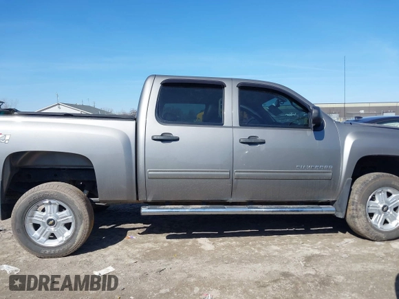 2013 Chevrolet Silverado 1500 LT with VIN 3GCPKSE79DG160065, listed as a IAAI auction lot 41793112 with 112,209 mi miles and . Bid and sale history available at DreamBid. Image 14.