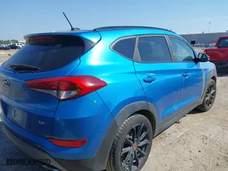 2017 Hyundai Tucson Value with VIN KM8J33A2XHU467861, listed as a IAAI auction lot 41684522 with 96,841 mi miles. Bid and sale history available at carsss.com. Image 4.