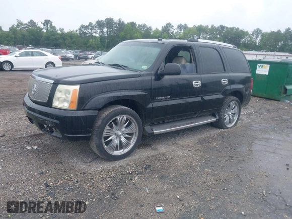 2003 Cadillac Escalade z VIN 1GYEK63N13R140496, wystawiony jako IAAI lot #42366303 z przebiegiem 90 940 mil mil oraz . Historia ofert i sprzedaży dostępna na DreamBid. Obrazek 2.