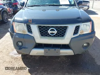 2012 Nissan Xterra X with VIN 5N1AN0NW2CC525949, listed as a IAAI auction lot 41840417 with 150,955 mi miles and . Bid and sale history available at DreamBid. Image 6.