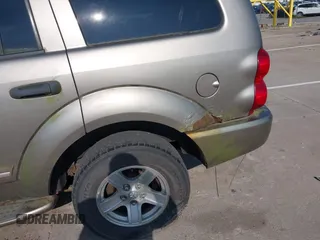 2004 Dodge Durango Limited z VIN 1D8HB58D64F100559, wystawiony jako IAAI lot #42369791 z przebiegiem 266 727 mil mil oraz . Historia ofert i sprzedaży dostępna na DreamBid. Obrazek 6.