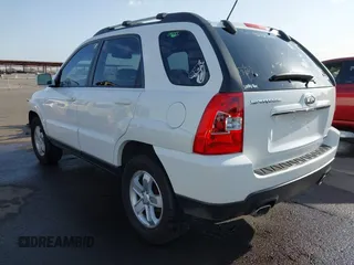 2009 Kia Sportage LX with VIN KNDJF723197622517, listed as a IAAI auction lot 41771268 with 127,112 mi miles. Bid and sale history available at carsss.com. Image 3.