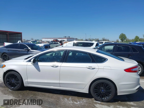 2014 Ford Fusion SE with VIN 3FA6P0HD3ER227077, listed as a IAAI auction lot 42007792 with 82,866 mi miles and . Bid and sale history available at DreamBid. Image 14.