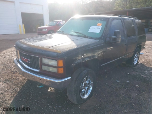 1997 Chevrolet Tahoe with VIN 1GNEK13R9VJ428657, listed as a IAAI auction lot 41324736 with 250,008 mi miles. Bid and sale history available at carsss.com. Image 2.