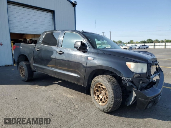 2012 Toyota Tundra with VIN 5TFDY5F14CX214234, listed as a Copart auction lot 60472275 with 205,225 mi miles and Salvage title. Bid and sale history available at DreamBid. Image 4.