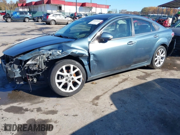 2013 Mazda 6 i Touring Plus z VIN 1YVHZ8EH8D5M15043, wystawiony jako IAAI lot #38068204 z przebiegiem 217 806 mil mil oraz . Historia ofert i sprzedaży dostępna na DreamBid. Obrazek 6.