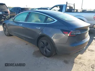 2018 Tesla Model 3 Long Range Battery with VIN 5YJ3E1EB0JF170215, listed as a IAAI auction lot 41969004 with 81,704 mi miles and . Bid and sale history available at DreamBid. Image 3.