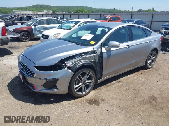 2020 Ford Fusion SEL with VIN 3FA6P0CDXLR196124, listed as a IAAI auction lot 42244231 with 99,306 mi miles and . Bid and sale history available at DreamBid. Image 18.