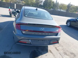 2022 Hyundai Sonata Hybrid Blue with VIN KMHL24JJ1NA041773, listed as a IAAI auction lot 41043553 with 23,696 mi miles. Bid and sale history available at carsss.com. Image 17.