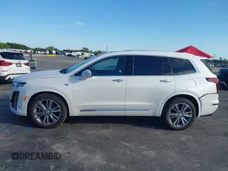 2025 Cadillac XT6 FWD Premium Luxury with VIN 1GYKPCRS9SZ122102, listed as a IAAI auction lot 41677275 with 4,227 mi miles. Bid and sale history available at carsss.com. Image 14.