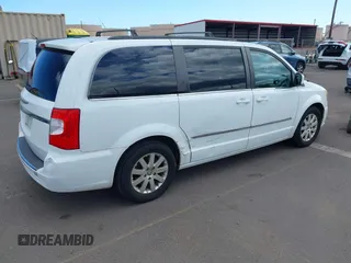 2014 Chrysler Town & Country Touring with VIN 2C4RC1BG1ER242842, listed as a IAAI auction lot 42043861 with 102,448 mi miles. Bid and sale history available at carsss.com. Image 4.